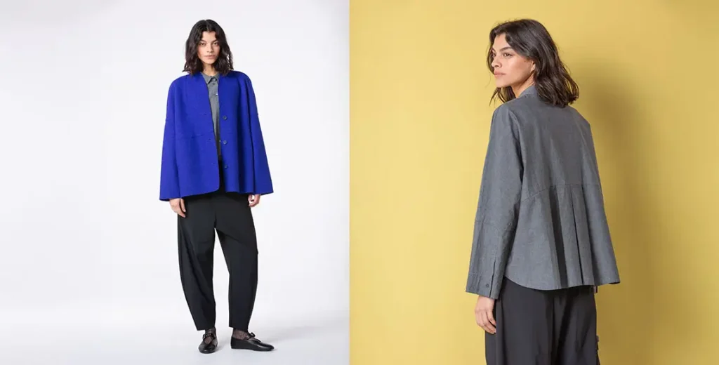 Two fashion models in stylish outerwear.